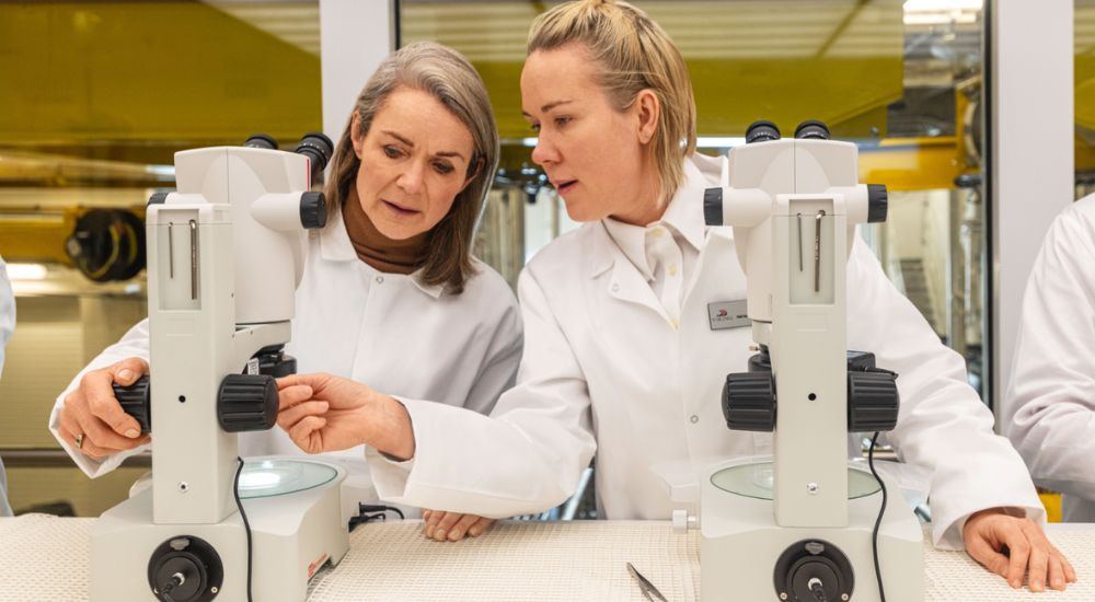 Two ladies studying samples in the Viking Cruises Laboratory