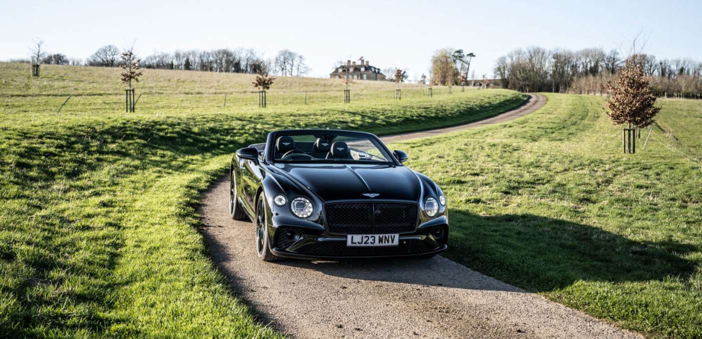 black convertible in countryside