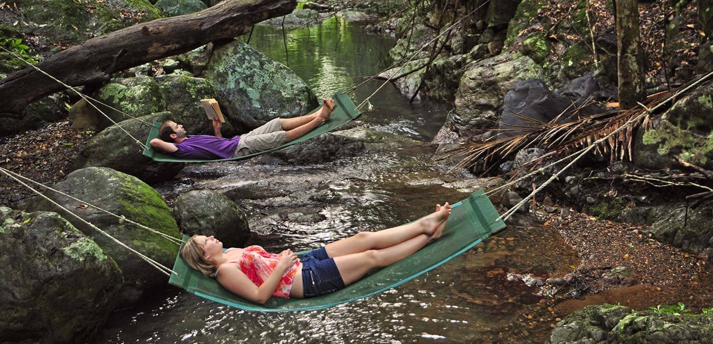 Relax in hammocks at Crystal Creek Rainforest Retreat