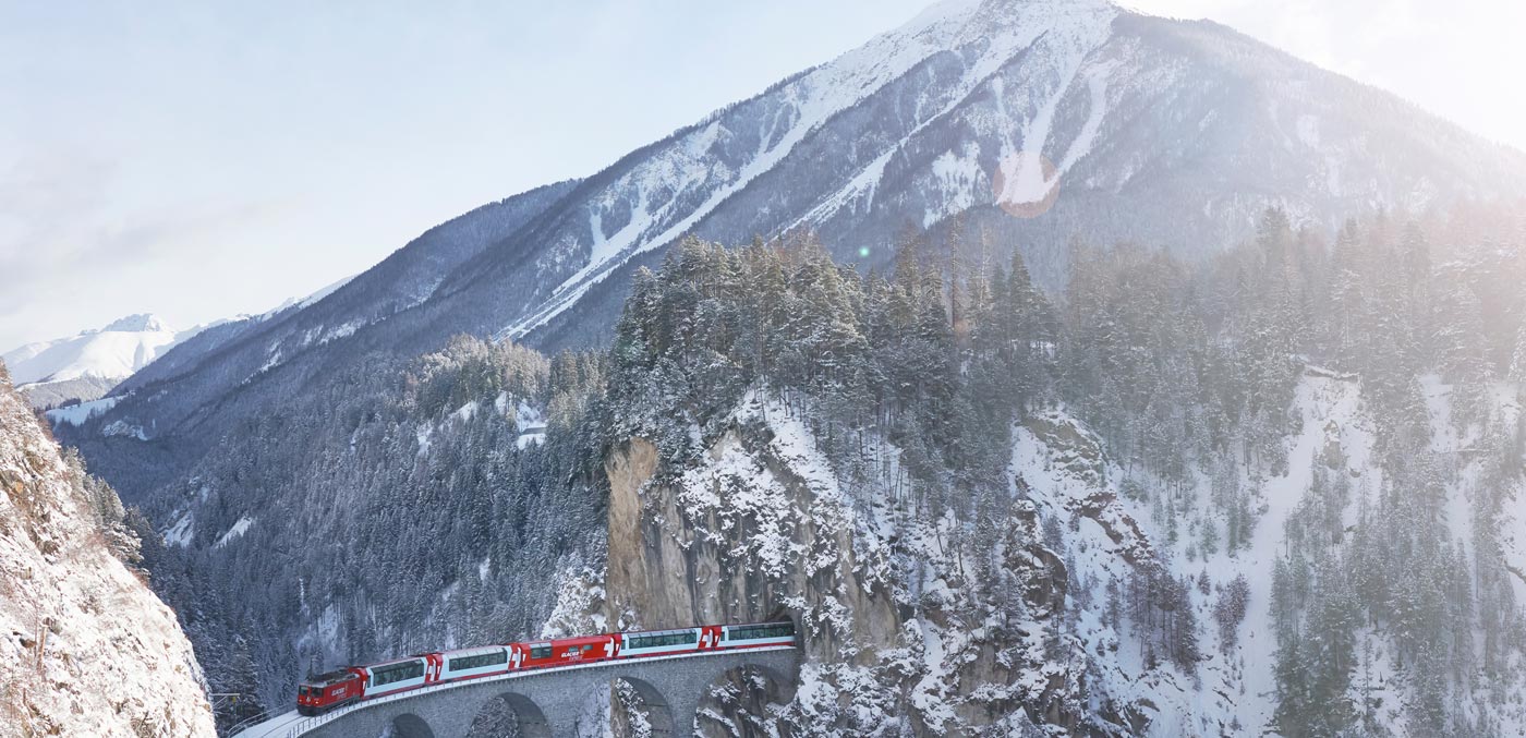 The Glacier Express carving through the dramatic Swiss countryside